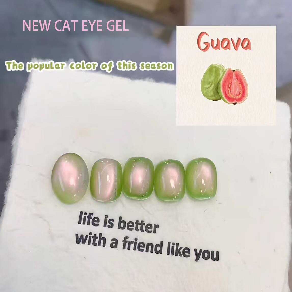 لهستانی ژل چشم گربه با الهام از Guava در مرکز ناخن قرار می گیرد